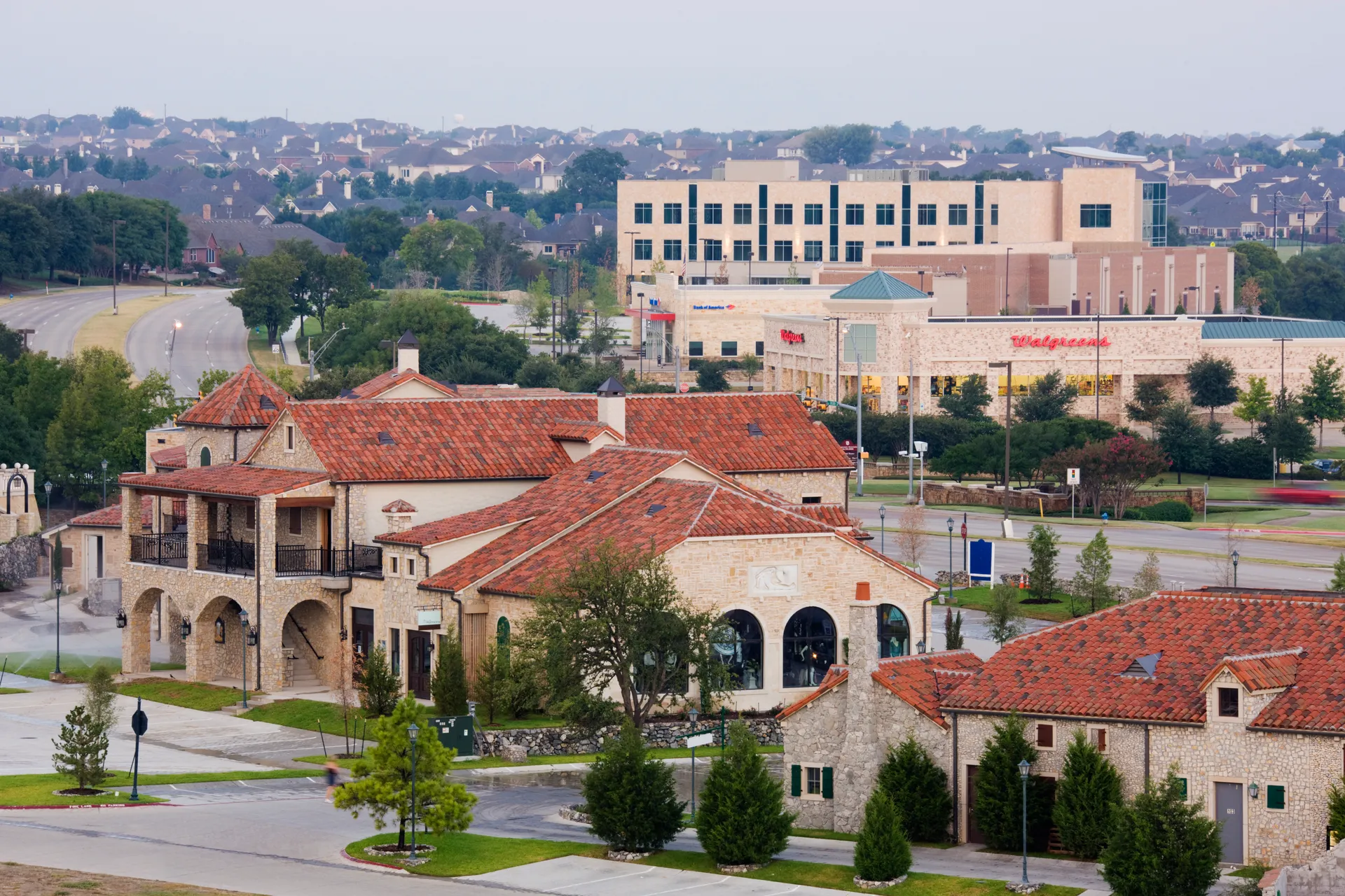 Elevated view over the stone buildings and terracotta rooftops of Adriatica Village